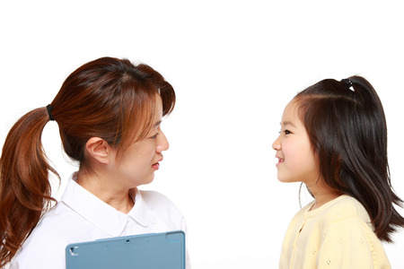 Nurse Talks To A Child Patientの写真素材
