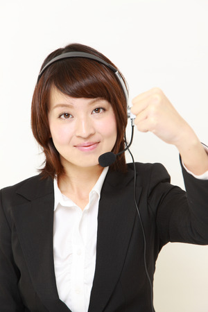 Japanese businesswoman in a victory poseの写真素材