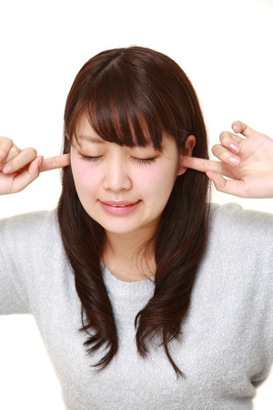 portrait of Young Japanese woman suffers from noiseの写真素材