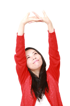 Japanese woman doing stretchの写真素材