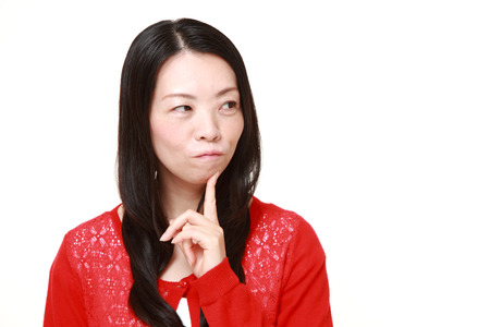 Japanese woman worriesの写真素材