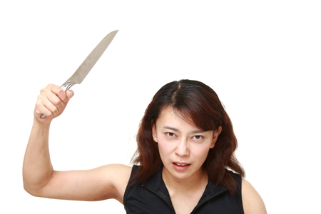 killer woman with knifeの写真素材
