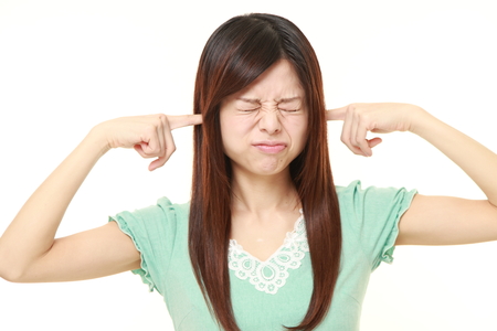 portrait of Young Japanese woman suffers from noiseの写真素材