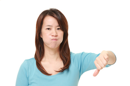 woman with thumbs down gesture