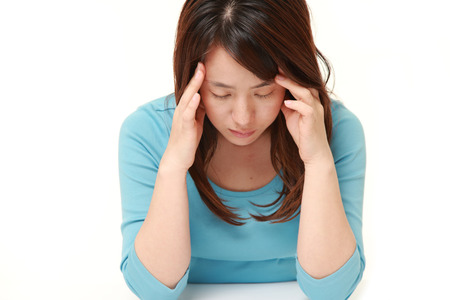 woman suffers from headacheの写真素材