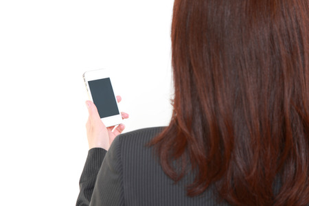 businesswoman with smart phoneの写真素材