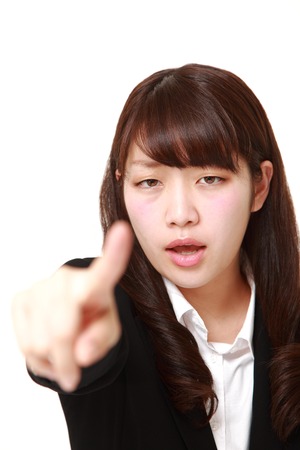 young Japanese businesswoman scoldingの写真素材