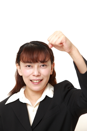 asian businesswoman in a victory poseの写真素材