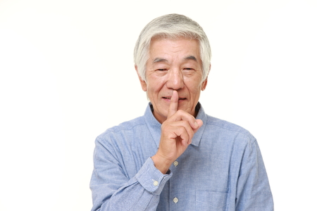 senior Japanese man whith silence gesturesの写真素材