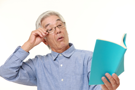 senior Japanese man with presbyopiaの写真素材