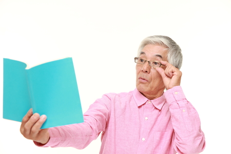 senior Japanese man with presbyopiaの写真素材