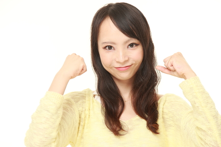 woman in a victory poseの写真素材