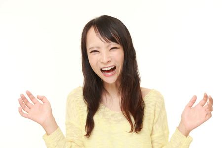 Japanese woman laughingの写真素材