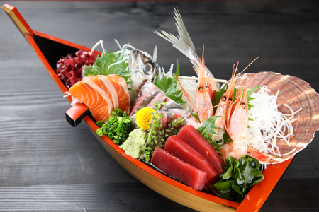 fresh sashimi boat on black background?の写真素材