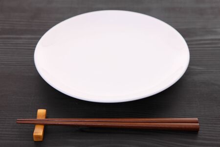 empty Japanese dish with chopsticksの写真素材