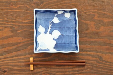 empty Japanese dish with chopsticksの写真素材