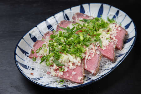 Sliced Roast Beef With Chopped Onionの写真素材