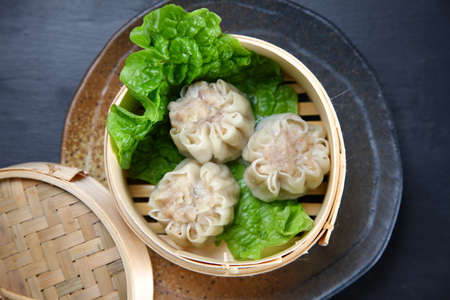 steamed meat dumpling in a steaming basketの写真素材