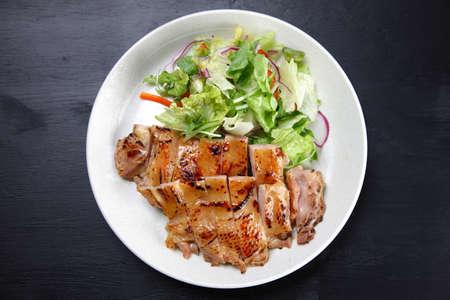 roasted chicken with fresh vegetablesの写真素材
