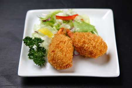 lobster croquette with fresh vegetablesの写真素材