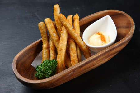 deep fried burdock with mayonnaiseの写真素材