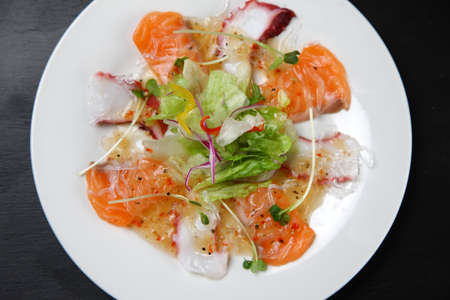 common octopus and salmon carpaccioの写真素材