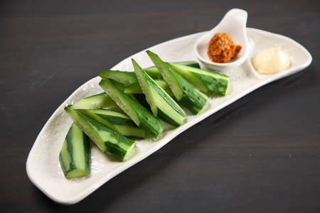 cucumber salad on dark backgroundの写真素材