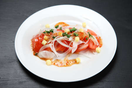 fresh tomato salad with cheeseの写真素材