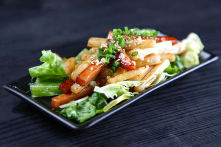 Chinese yam and spam stir fryの写真素材
