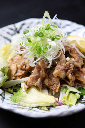 grilled chicken outside skirt with lemonの写真素材