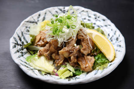 grilled chicken outside skirt with lemonの写真素材