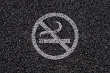 no smoking sign paint on asphaltの写真素材