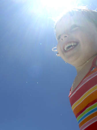 Little girl playing at neighborhood pool
