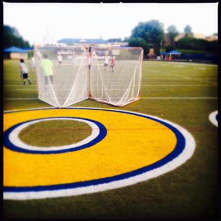 Kids playing soccer at schoolの素材