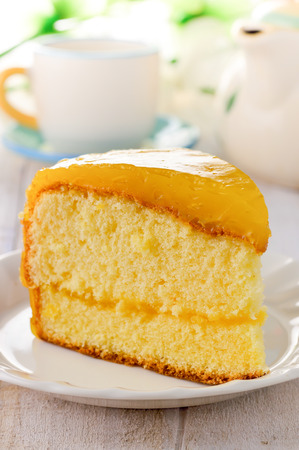 orange cake on the white tableの写真素材