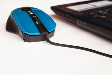 click computer mouse  on isolated backgroundの写真素材