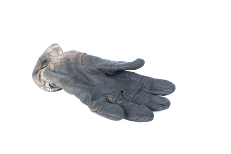 Old gloves leather on isolatedの写真素材