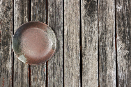 empty plate on Wood backgroundの写真素材