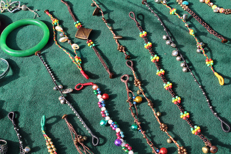 beaded necklace on sackcloth background