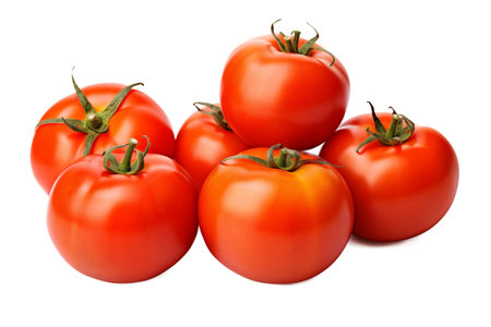 This vibrant and plump tomato stands out against a pristine white background, showcasing its freshness and juiciness.の写真素材