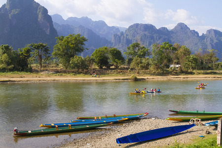 VANG VIENG, LAO P D R  Unidentified tourists are rowing kayak  in Song River  in Vang Vieng, Lao P D Rのeditorial素材