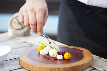 Closeup of Human hands cooking  in kitchen