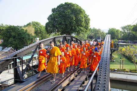 Go on a trip with the monks, Bridge on the river kwai, Kanchanaburi province Thailandのeditorial素材