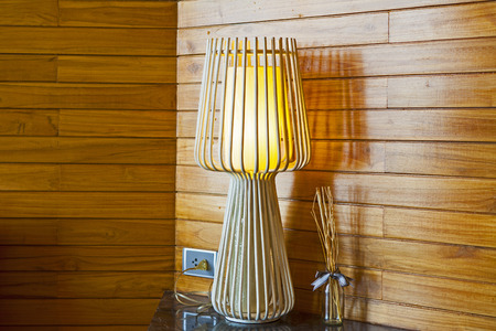 The interior of a bedroom with a lamp.の写真素材