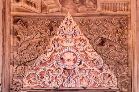 Wood carving antique Wat Guti Bangkem,Thailandの写真素材
