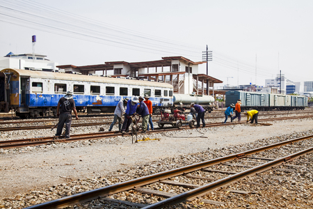 10 March 2016 A hardworking engineers are repairing a railroad at Nakhon Ratchasima station.のeditorial素材