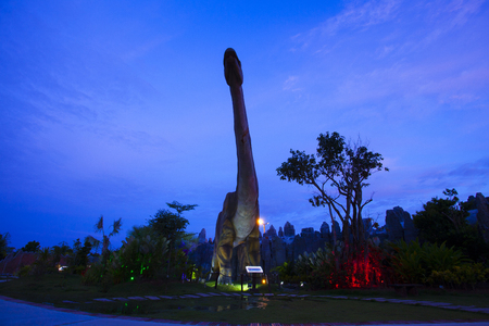 -20 September 2016 At the Dinosaur park Dannok Sadao District, Songkhla in Thailand opening hours 10.00 am. - 10.00 pm. In the evening have the blue sky and the light make it beautiful.のeditorial素材
