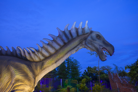 -20 September 2016 At the Dinosaur park Dannok Sadao District, Songkhla in Thailand opening hours 10.00 am. - 10.00 pm. In the evening have the blue sky and the light make it beautiful.のeditorial素材