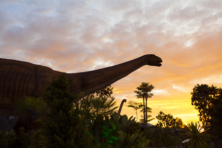 -20 September 2016 At the Dinosaur park Dannok Sadao District, Songkhla in Thailand opening hours 10.00 am. - 10.00 pm. In the evening have the blue sky and the light make it beautiful.のeditorial素材