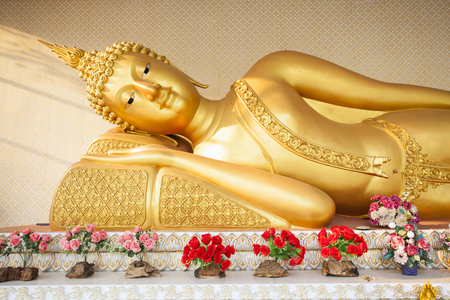 Giant buddha statue in sleeping style, gold buddha statue. Wat Phra That Doi Wiang.のeditorial素材